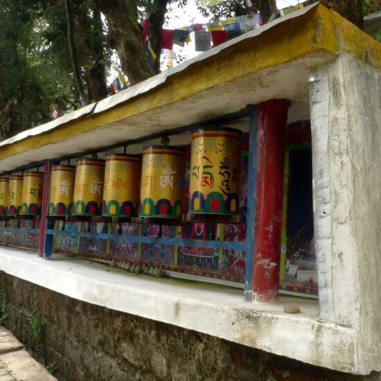 Tibetan prayer wheels on the Walk of Remembrance around the Dalai Lama Temple