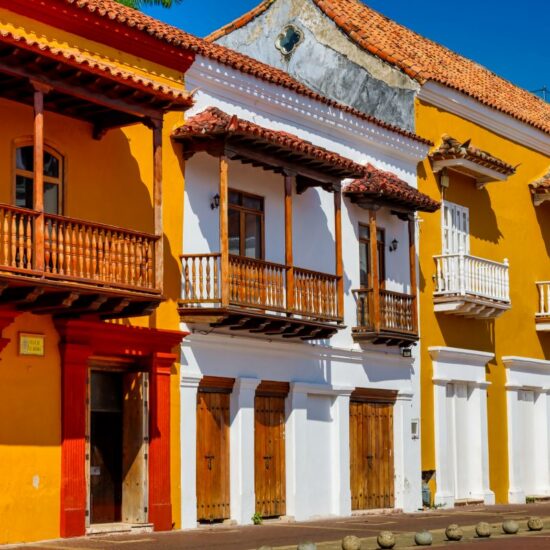 Bicycle parked at the entrance to a traditional building in Cartagena de Indias, Colombia