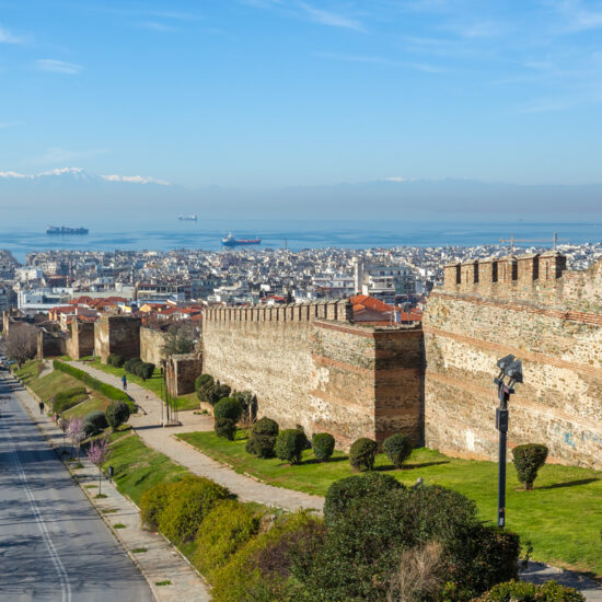 10.03.2018 Thessaloniki, Greece Panoramic View of Thessaloniki and its Byzantine Wall Ruins, along with Thermaikos Gulf and Mount Olympus in the Background