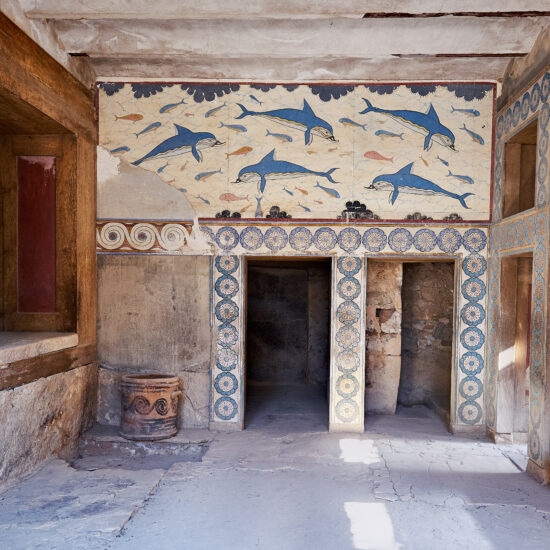 Dolphin fresco in main palace of Cnossos. Knossos is the largest Bronze Age archaeological site on Crete island, Greece