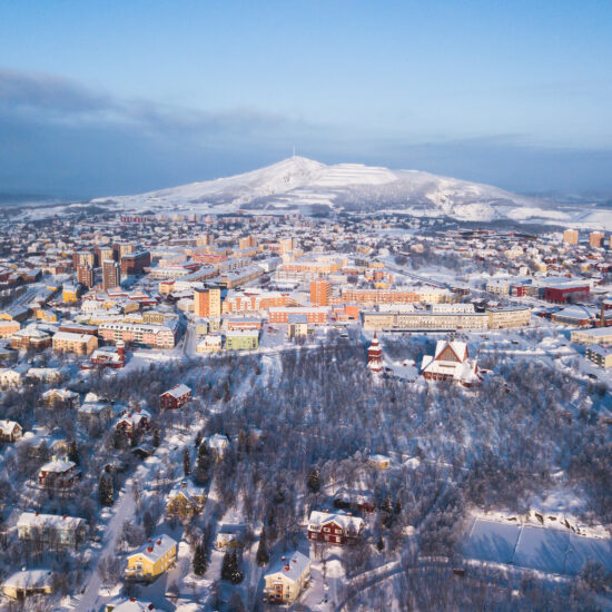 Aerial winter view of Kiruna, the northernmost town in Sweden, province of Lapland, winter sunny picture shot from drone