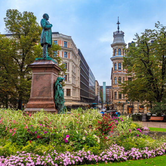 Helsinki. Finland. Streets Of Helsinki. Monuments Of Helsinki. The Statue Of Johan Ludwig Runeberg. Runeberg monument on the background of a flower bed. Autumn trip to Finland.