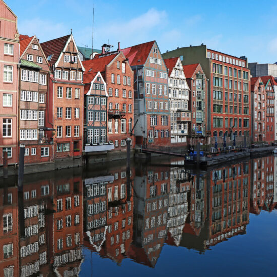 View of buildings along a canal in Hamburg, Germany