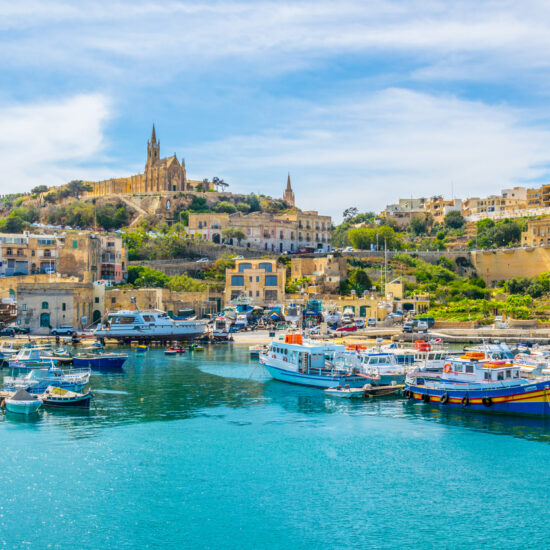 Fishing boats moor in Mgarr, Gozo, Malta