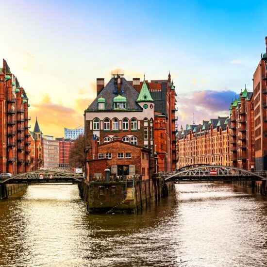 The Warehouse district Speicherstadt during sunset in Hamburg, Germany. Old warehouses in Hafencity quarter in Hamburg.