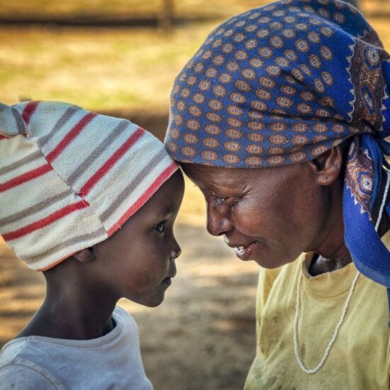 African granny together with her granddaughter