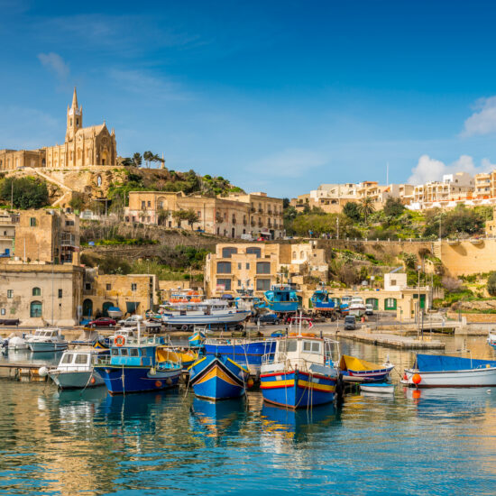 Port of the island of Gozo with its fishing boats, in Malta in the far south of Europe