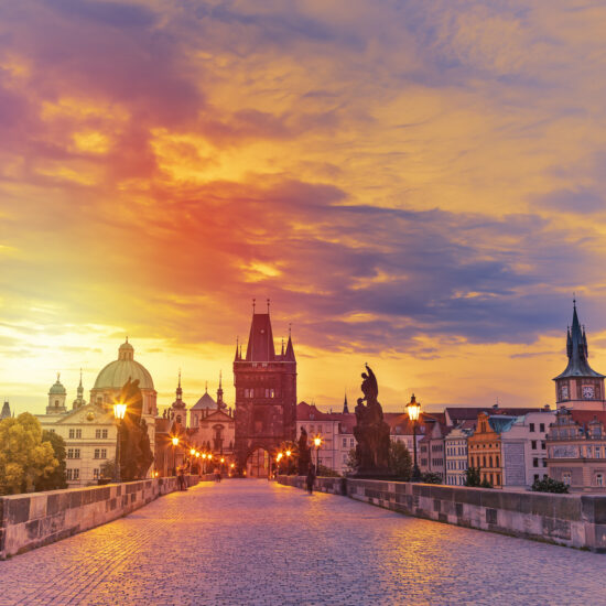 View of Charles Bridge in Prague during sunset, Czech Republic. The world famous Prague landmark.