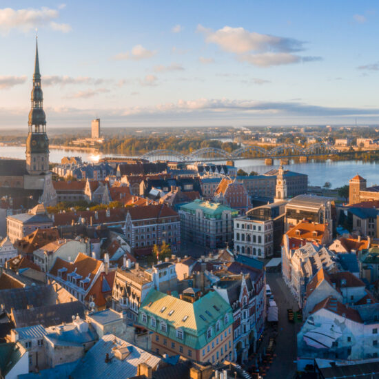 Aerial shot of the old town of Riga in Lativa during a beautiful sunset
