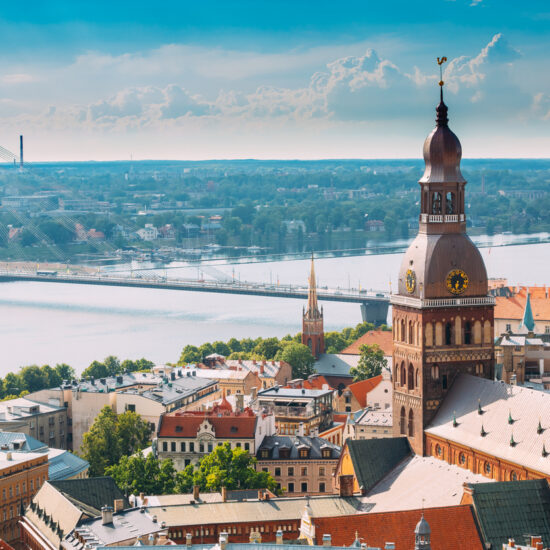 Riga, Latvia. Cityscape In Sunny Summer Day. Famous Landmark Riga Dome Cathedral