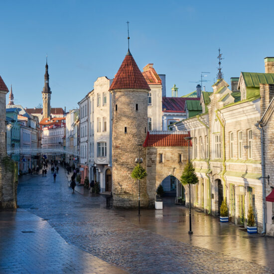 Old medieval Viru Gate in Tallinn city. Cityscape of old town of Tallinn, Estonia.